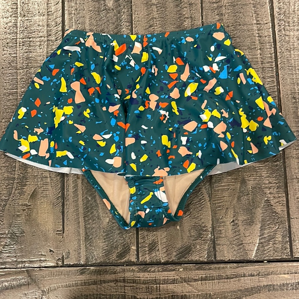 Skirted swim bottom